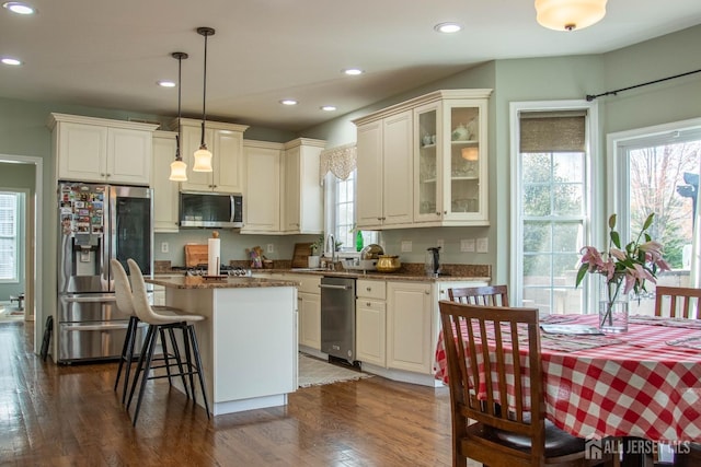 23 Keswick Cir, Monroe, NJ 08831 - kitchen featuring stainless steel appliances, a sink, glass insert cabinets, a center island, and recessed lighting