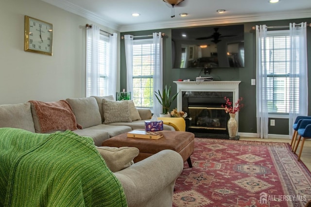 23 Keswick Cir, Monroe, NJ 08831 - living area featuring a premium fireplace, crown molding, recessed lighting, baseboards, and a ceiling fan