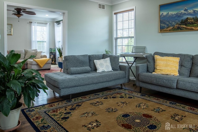 23 Keswick Cir, Monroe, NJ 08831 - living area featuring crown molding, wood finished floors, and a ceiling fan
