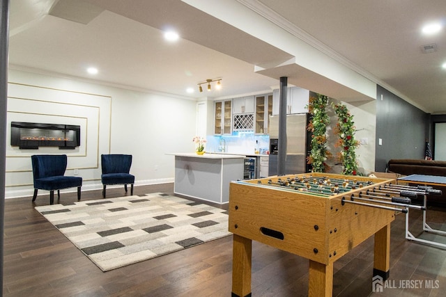 23 Keswick Cir, Monroe, NJ 08831 - recreation room with ornamental molding, wine cooler, baseboards, bar area, and recessed lighting