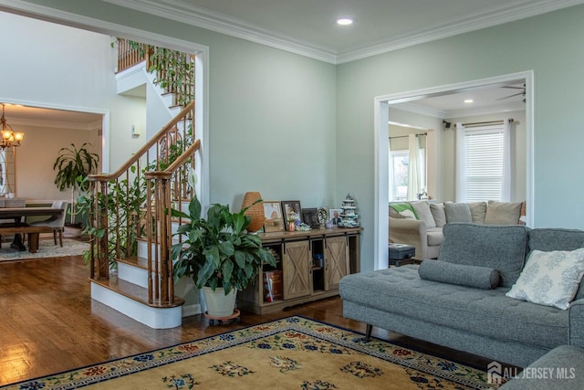 23 Keswick Cir, Monroe, NJ 08831 - living area with wood finished floors, stairs, a chandelier, crown molding, and recessed lighting