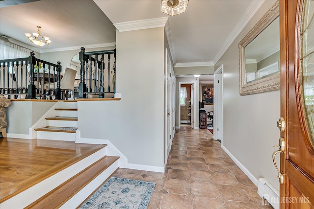 10 Rainbow Dr, Colonia, NJ 07067 - foyer featuring a chandelier, stairway, and ornamental molding