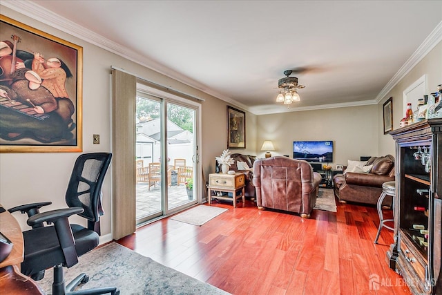 10 Rainbow Dr, Colonia, NJ 07067 - home office with wood finished floors, ornamental molding, and ceiling fan