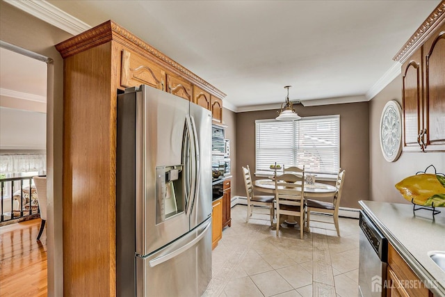 10 Rainbow Dr, Colonia, NJ 07067 - kitchen featuring stainless steel appliances, ornamental molding, healthy amount of natural light, light tile patterned floors, and brown cabinetry