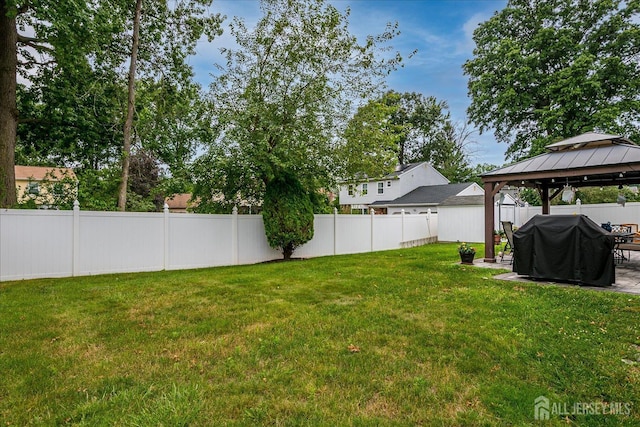 10 Rainbow Dr, Colonia, NJ 07067 - fenced backyard featuring a gazebo and a patio