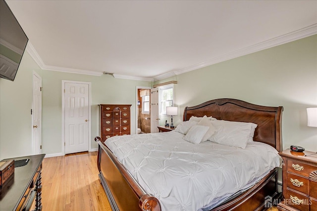 10 Rainbow Dr, Colonia, NJ 07067 - bedroom featuring light wood-type flooring and ornamental molding