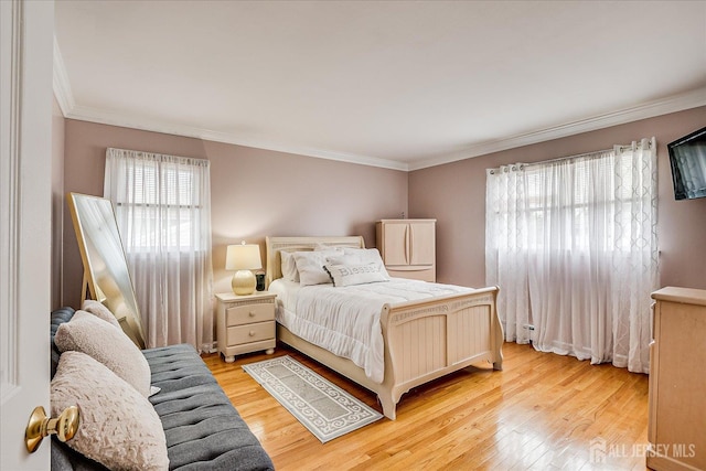 10 Rainbow Dr, Colonia, NJ 07067 - bedroom featuring light wood-style flooring and crown molding