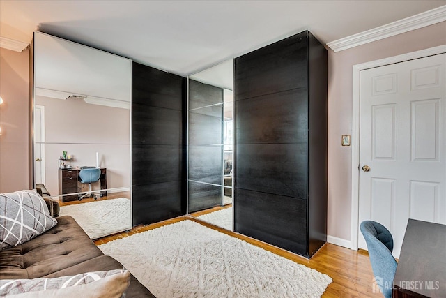 10 Rainbow Dr, Colonia, NJ 07067 - bathroom with ornamental molding and wood finished floors