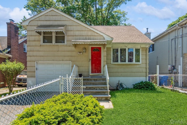 view of front of property featuring entry steps, an attached garage, fence, roof with shingles, and a front lawn