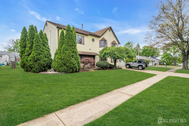 28 Colton Rd, Edison, NJ 08817 - view of property exterior featuring concrete driveway, a lawn, and a shingled roof
