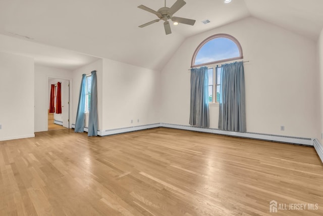 additional living space featuring a ceiling fan, light wood-style floors, lofted ceiling, and baseboards