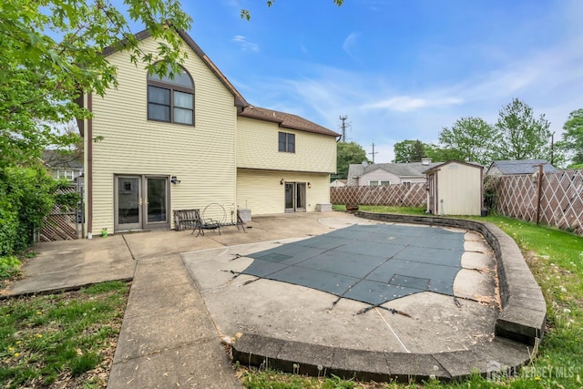 28 Colton Rd, Edison, NJ 08817 - back of property featuring a fenced backyard and a patio