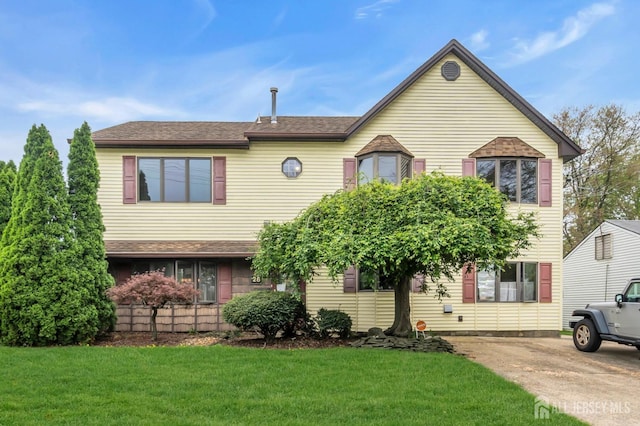 view of front of house with a front lawn