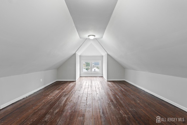 89 Woodbridge Ave, Highland Park, NJ 08904 - additional living space with baseboards, vaulted ceiling, and hardwood / wood-style flooring