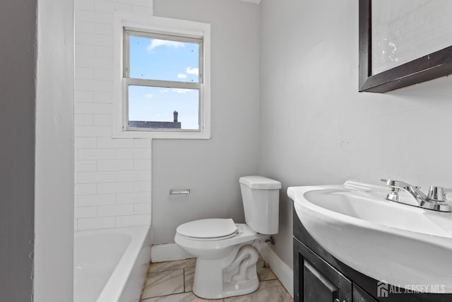 89 Woodbridge Ave, Highland Park, NJ 08904 - bathroom with toilet, baseboards, marble finish floor, and vanity