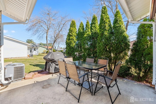 375-C Duranta Plz, Monroe, NJ 08831 - view of patio with central AC, a grill, and outdoor dining area