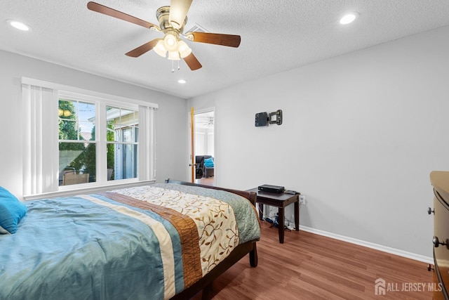 375-C Duranta Plz, Monroe, NJ 08831 - bedroom with a textured ceiling, wood finished floors, recessed lighting, baseboards, and ceiling fan