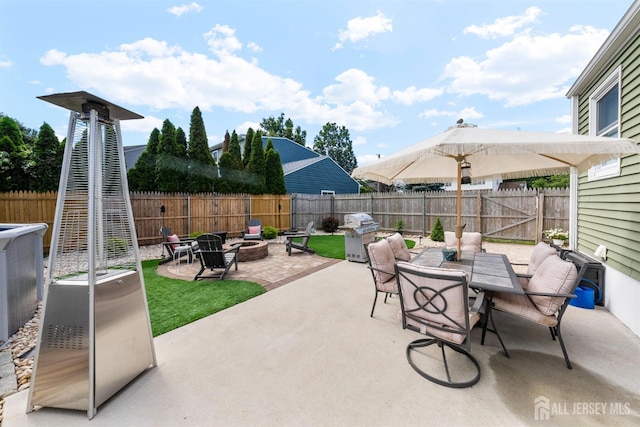 11 Stockton Rd, New Brunswick, NJ 08901 - fenced backyard with an outdoor fire pit, a patio, outdoor dining area, and grilling area