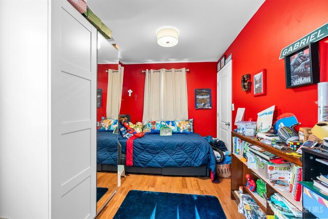 11 Stockton Rd, New Brunswick, NJ 08901 - bedroom with wood finished floors
