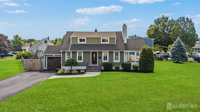 11 Stockton Rd, New Brunswick, NJ 08901 - view of front of property with an attached garage, asphalt driveway, roof with shingles, and a chimney