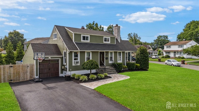 11 Stockton Rd, New Brunswick, NJ 08901 - colonial inspired home with asphalt driveway, roof with shingles, a chimney, and a garage