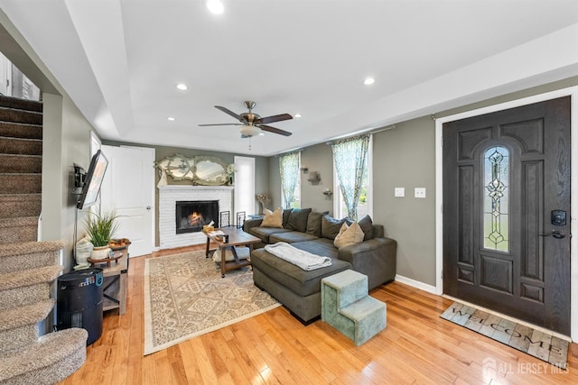 11 Stockton Rd, New Brunswick, NJ 08901 - living area with stairs, light wood-style flooring, ceiling fan, and recessed lighting