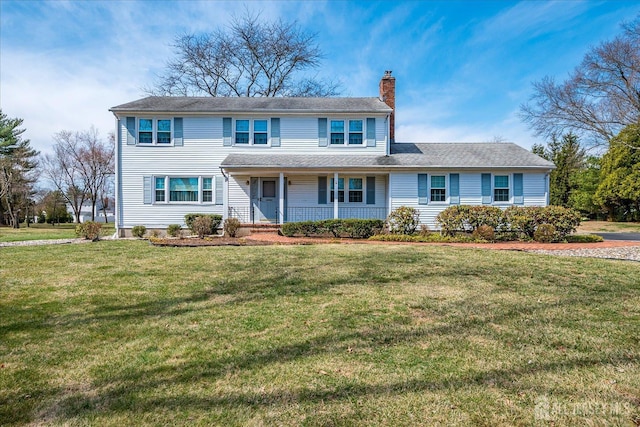31 Riverview Ter, Hillsborough, NJ 08844 - view of front facade featuring a chimney, covered porch, and a front lawn