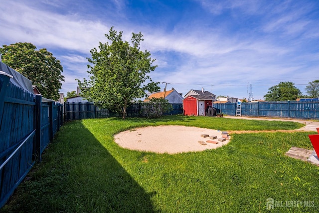 86 Lawrence St, Fords, NJ 08863 - fenced backyard with a storage unit and a patio area