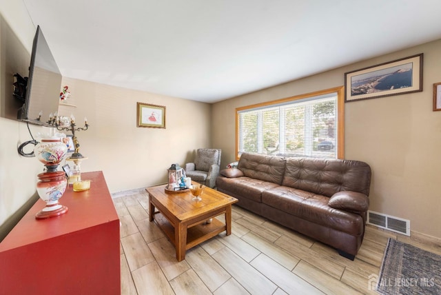 86 Lawrence St, Fords, NJ 08863 - living area with wood tiled floors and baseboards