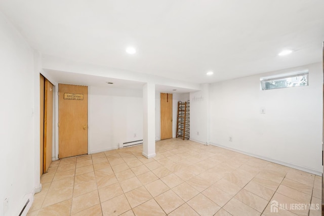 86 Lawrence St, Fords, NJ 08863 - finished below grade area featuring a baseboard heating unit, recessed lighting, and light tile patterned flooring