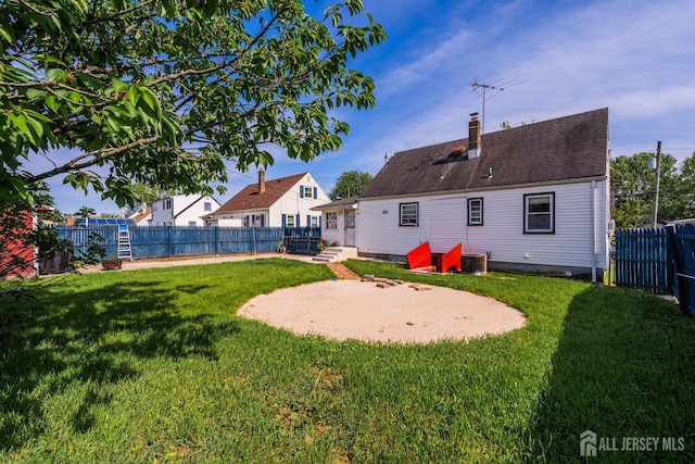 86 Lawrence St, Fords, NJ 08863 - rear view of property with a chimney, a patio, and a fenced backyard