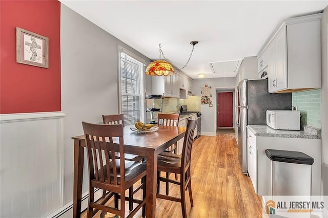 77 Navesink Ave, Middletown, NJ 07748 - dining space featuring attic access and light wood finished floors