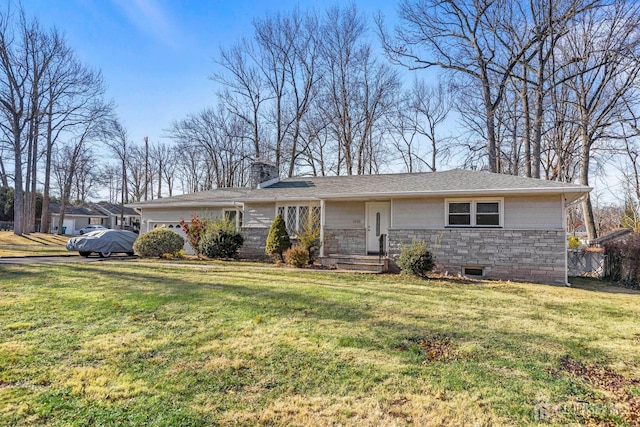 ranch-style home with a front lawn