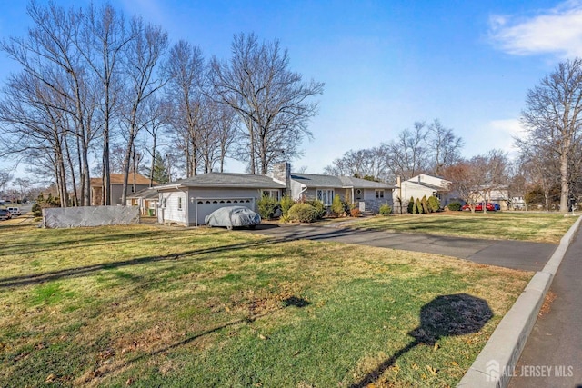 view of front of home with a front yard