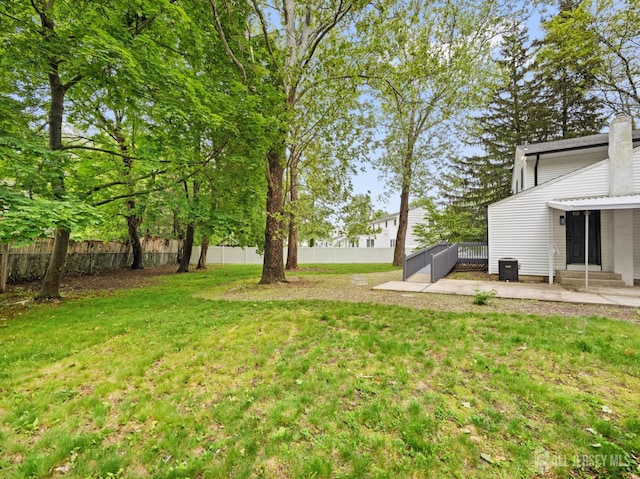 8 S Surrey Ln, East Brunswick, NJ 08816 - fenced backyard with a patio and entry steps