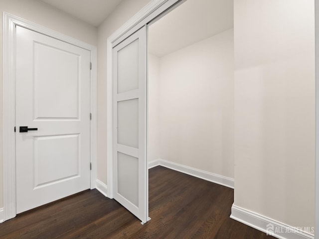 8 S Surrey Ln, East Brunswick, NJ 08816 - hall featuring dark wood-style floors and baseboards