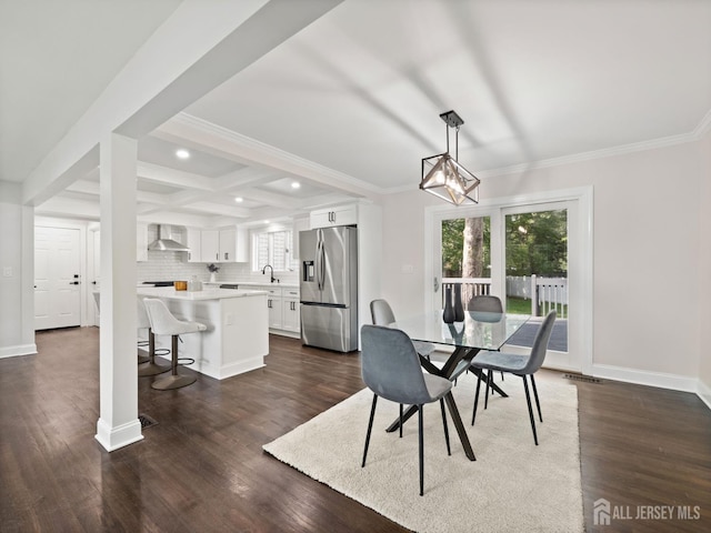 8 S Surrey Ln, East Brunswick, NJ 08816 - dining space with plenty of natural light, recessed lighting, ornamental molding, and dark wood-style flooring