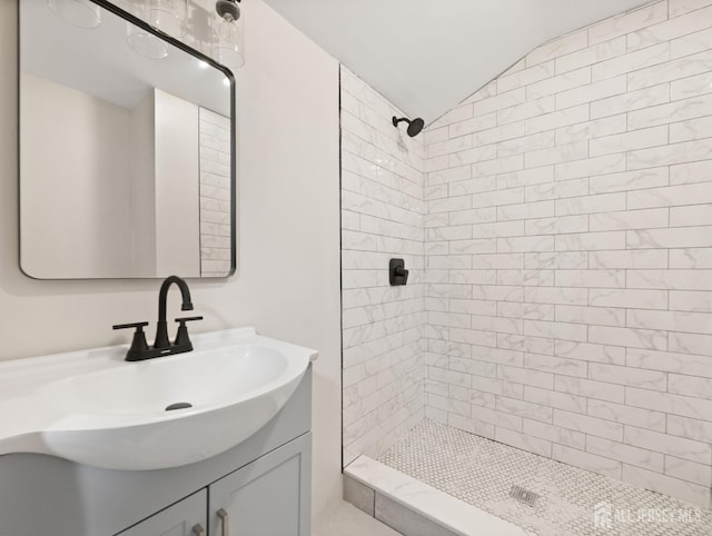 8 S Surrey Ln, East Brunswick, NJ 08816 - full bath featuring tiled shower, vanity, and lofted ceiling
