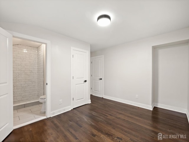 8 S Surrey Ln, East Brunswick, NJ 08816 - unfurnished bedroom with wood finished floors and ensuite bathroom