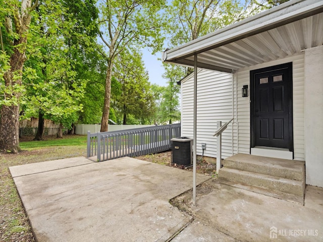 8 S Surrey Ln, East Brunswick, NJ 08816 - doorway to property featuring a patio area