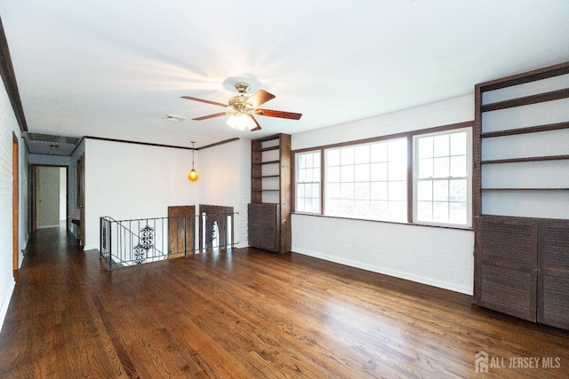 28 Beechwood Ave, Edison, NJ 08837 - empty room with a ceiling fan, wood finished floors, and baseboards