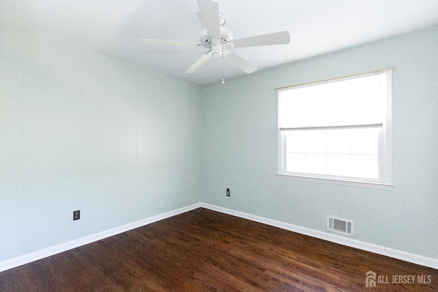 28 Beechwood Ave, Edison, NJ 08837 - unfurnished room with dark wood-type flooring, baseboards, and ceiling fan