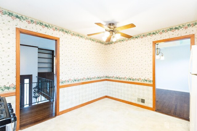 28 Beechwood Ave, Edison, NJ 08837 - empty room featuring wallpapered walls and a ceiling fan