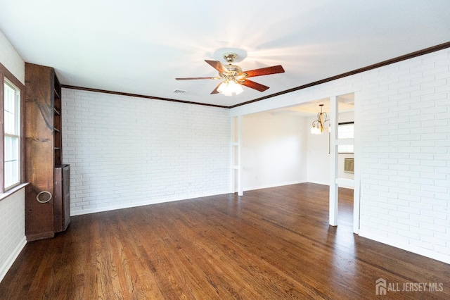 28 Beechwood Ave, Edison, NJ 08837 - empty room featuring brick wall, a ceiling fan, plenty of natural light, wood finished floors, and ornamental molding