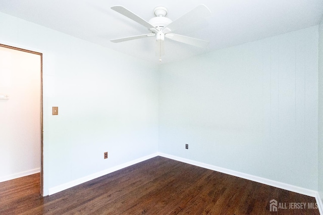 28 Beechwood Ave, Edison, NJ 08837 - spare room with dark wood-style flooring, baseboards, and a ceiling fan