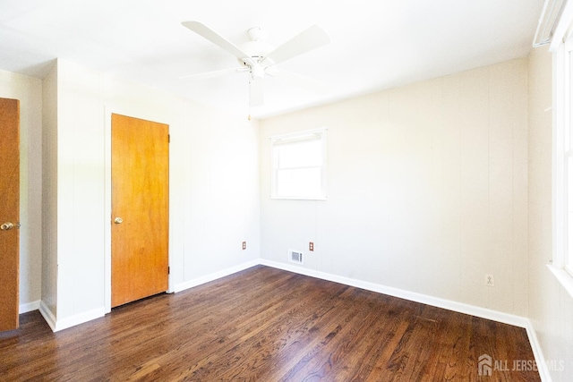 28 Beechwood Ave, Edison, NJ 08837 - spare room with dark wood-style flooring, a ceiling fan, and baseboards