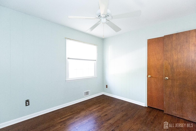 28 Beechwood Ave, Edison, NJ 08837 - unfurnished bedroom with dark wood-style flooring, baseboards, and a ceiling fan