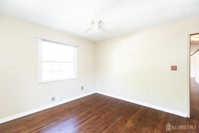 28 Beechwood Ave, Edison, NJ 08837 - spare room with a ceiling fan, dark wood-style flooring, and baseboards