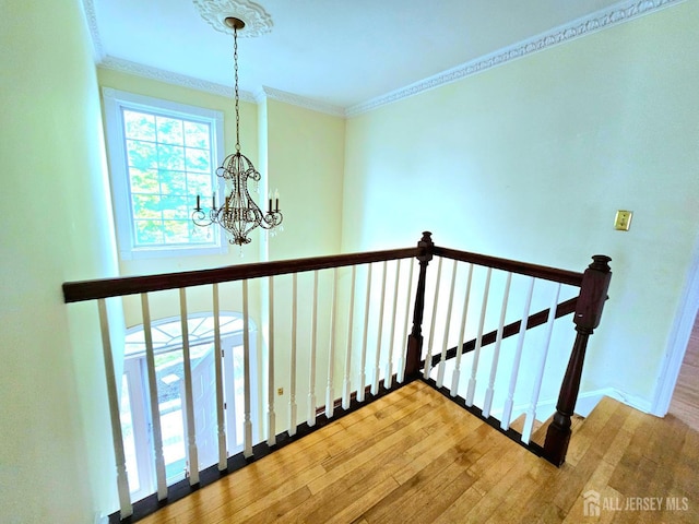 53 Perilli Dr, Hamilton, NJ 08610 - stairs featuring a chandelier, wood finished floors, crown molding, and baseboards