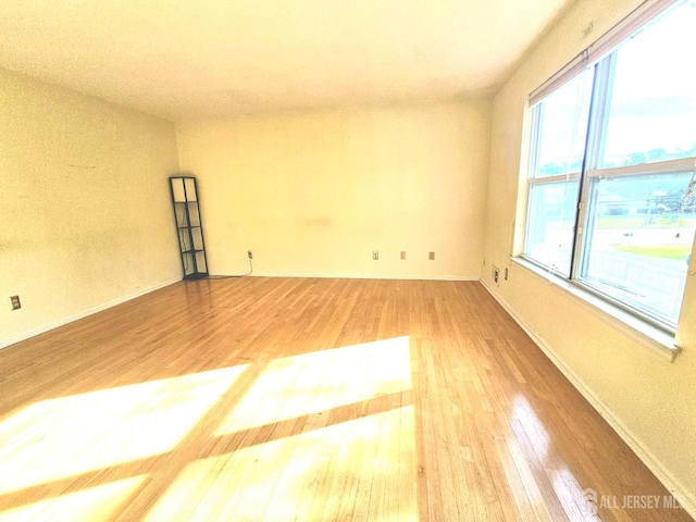 53 Perilli Dr, Hamilton, NJ 08610 - unfurnished room with wood finished floors and baseboards